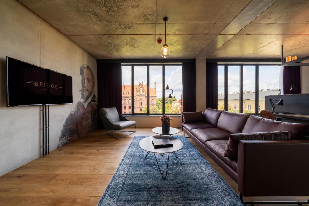 The Bridge Wroclaw - Mgallery Exterior foto A living room at Bridge on Main